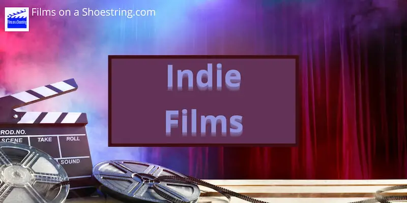Indie films title card in front of a cinema or movie theater curtain, with film reels and clapperboard on table